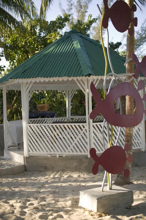 Whistling Bird Hotel Negril Bagian luar foto